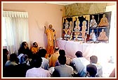 Swamishri blesses the devotees after the murti pratishtha ceremony