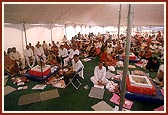Devotees participate in the murti pratishtha yagna 