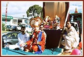 A float carrying the murti of Bhagwan Swaminarayan, Shri Ganapatiji and Shri Hanumanji