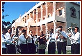 The marching band performing a finale at the end of the procession