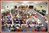 Devotees participate in the yagna for the murti pratishtha ceremony