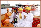 Sadhus and senior devotees on the boat