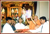 Swamishri releases the murti pratishtha souvenir magazine