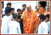 Swamishri with the balaks outside the mandir on the morning of Bal Din