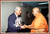 Federal Minister for Immigration and Cultural Affairs, Mr. Phil Ruddock with Swamishri