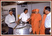 Swamishri sanctifies the mandir kitchen