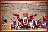 Kishores perform a traditional dance on the mandir stage