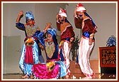 Kishores perform a traditional dance on the mandir stage
