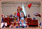 Kishores perform a traditional dance on the mandir stage