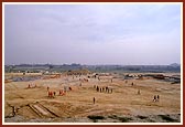 Swamishri and the entourage of sadhus head towards the monument