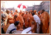 Swamishri is shown the construction plans