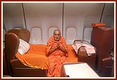 After saying the chesta on flight Swamishri retires for rest