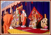 Swamishri performs the murti pratishtha rituals of Shri Akshar Purushottam Maharaj and deities for the mandir in Ranoli village