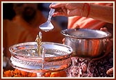 Panchamrut snan - where Shri Harikrishna Maharaj is bathed in water, ghee, honey, sugar and curd and finally with water