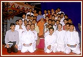 Students of A.P.C. are honored for their outstanding academic achievements and blessed by Swamishri