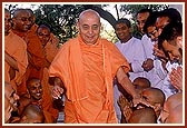 ... and blesses the sadhus and sadhaks in the pradakshina