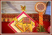 Decorative designs form the stage backup