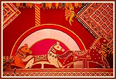 Traditional figures adorn the stage