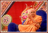 Swamishri responds happily while the sadhus sing bhajans