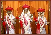(L to R) Beautifully adorned murtis of Shri Gunatitanand Swami, Shri Sahajanand Swami and Shri Gopalanand Swami