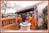 Engaged in darshan of shrine adjacent to Nishkulanand Swami's room