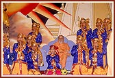 Balaks with Swamishri after performing a folk dance