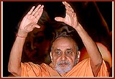 Swamishri responds with encouraging gestures while the bhajan 'Aje Yagnapurushne dwar nobat vage re lol…' was being sung by sadhus