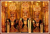 (L to R) Shri Gunatitanand Swami, Shri Sahajanand Swami and Shri Gopalanand Swami festively attired for the Shri Hari Jayanti celebration