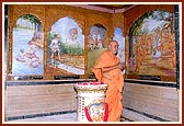 After darshan, Swamishri performs pradakshina of the shrine of Gunatitanand Swami's birth place