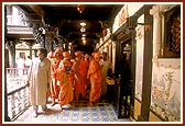 Swamishri engaged in darshan of Shriji Maharaj's relics preserved in the Haveli