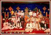 The prominent devotees of Rajkot welcome Shri Harikrishna Maharaj and Swamishri in a unique way