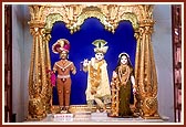 Shri Harikrishna Maharaj adorned in chandan and Shri Radha Krishna Dev