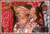 Tribal devotees traditionally welcome Swamishri