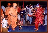 Swamishri blesses a tribal child&nbsp;