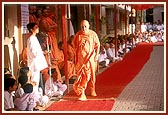 Balaks deliver speeches during Swamishri's morning walk&nbsp;