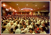 Swamishri and devotees at the newly built 'Yogi Sabha Gruh' where puja and discourses are held