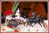 Shri Harikrishna Maharaj adorned in a rath (chariot)