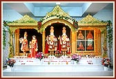 The deities adorned in a beautiful sinhasan at the Swaminarayan Mandir, Dummas