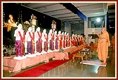 Swamishri performs the murti pratishtha and ritual arti of Shri Akshar Purushottam Maharaj and deities to be installed in mandirs&nbsp;in USA, namely, Boston, Columbus, Cherry Hill and Atlantic City