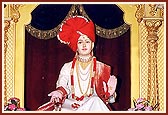 Utsav murti of Shriji Maharaj adorned in a majestic sinhasan