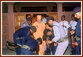 Members of the State Security Force seek Swamishri's blessings 