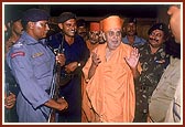 Members of the State Security Force seek Swamishri's blessings 