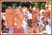 Swamishri talks to and blesses students who study at Pramukh Swami Vidya Mandir in Sarangpur 