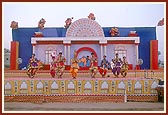 Swamishri on stage during the evening assembly