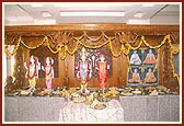 Annakut is offered to the newly consecrated murtis 