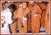Swamishri performs the ground-breaking ceremony for a new Satsang center
