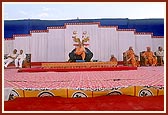 Swamishri seated on stage during the public assembly 