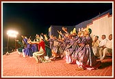 Children and youths perform a traditional dance