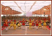 Youths perform a traditional dance in the assembly 