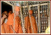 Shri Harikrishna Maharaj is placed on the scale on which Shri Ranchhodray had been weighed with honor